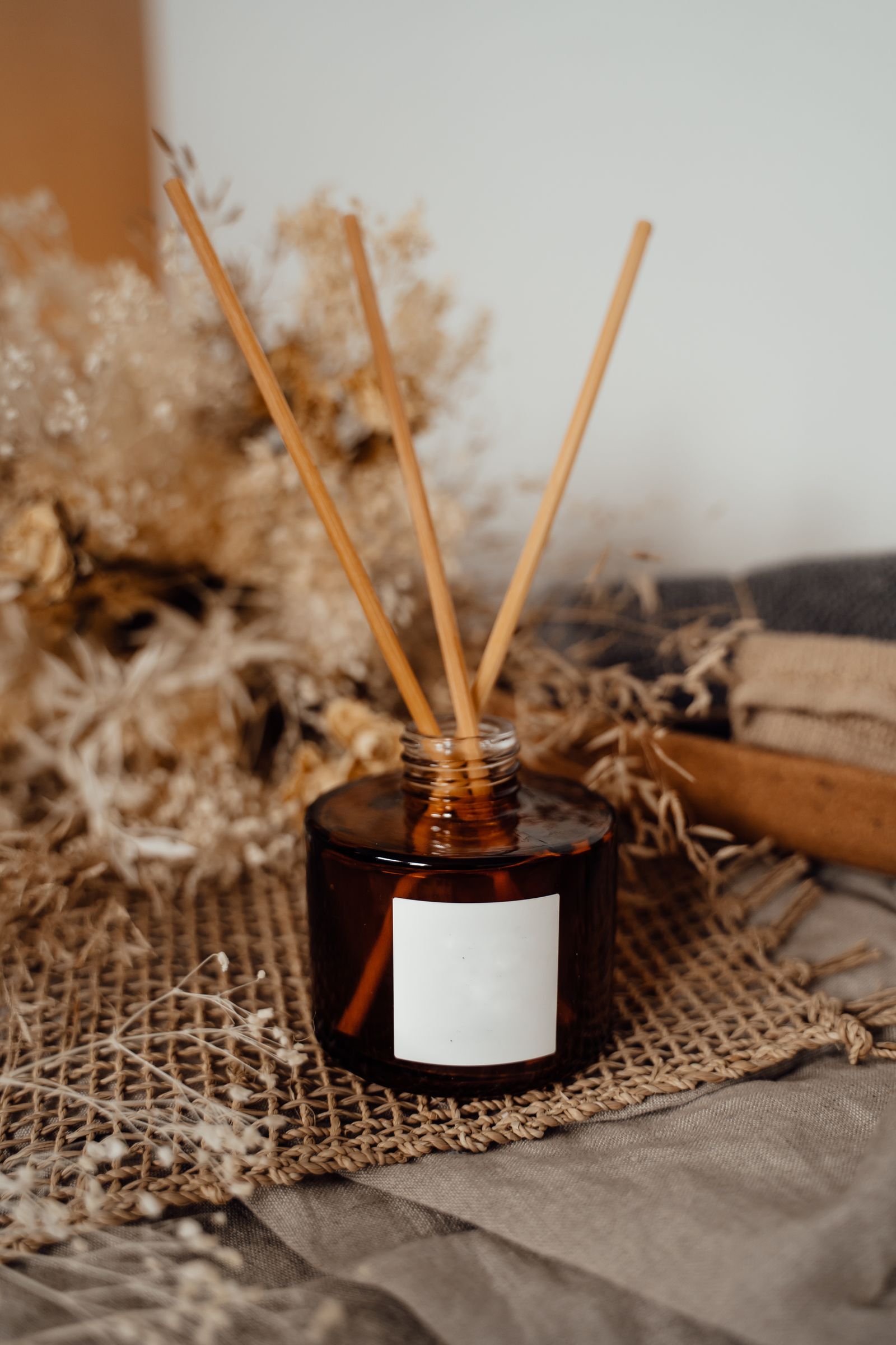 Amber reed diffuser with natural textures