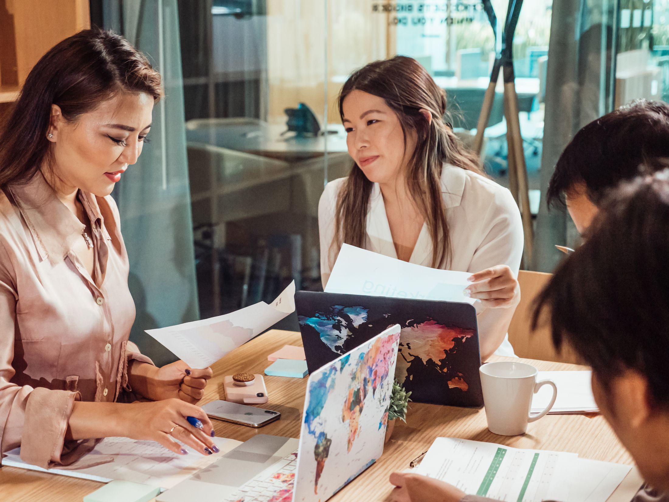 Representative stock photograph of Asian professionals collaborating